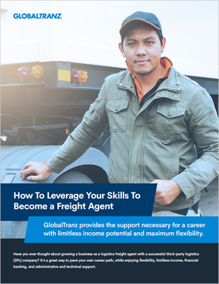 How-To-Leverage-Your-Skills-To-Become-Freight-Agent-PDF A person wearing a cap and a green jacket stands in front of a large truck, embodying the career flexibility and income potential of becoming a Freight Agent with GlobalTranz.